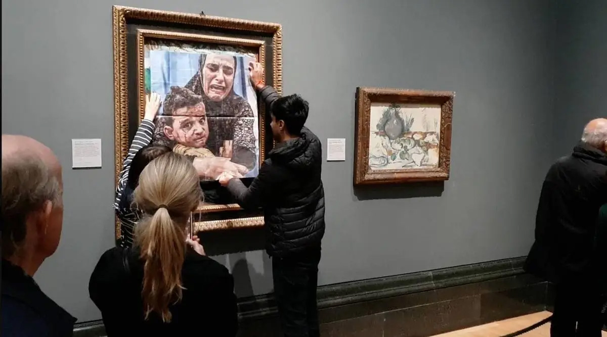 Activists Cover Picasso`s "Motherhood" Painting with Image of Gazan Mother and Child