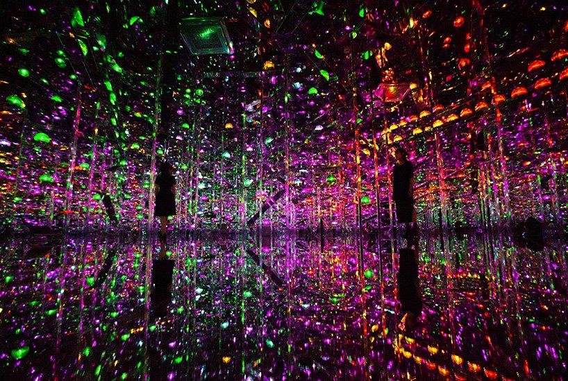 teamLab creates a borderless microcosmose fusing light sound and art in shanghai